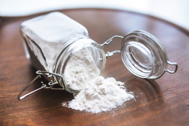 brushing teeth with baking soda