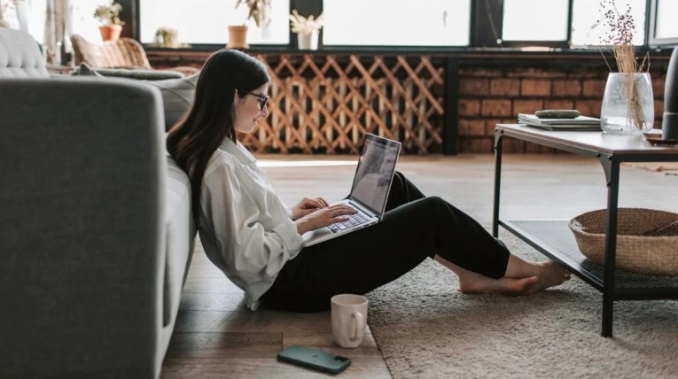 woman-working-at-home-with-her-worlfromhome-nextcolumn